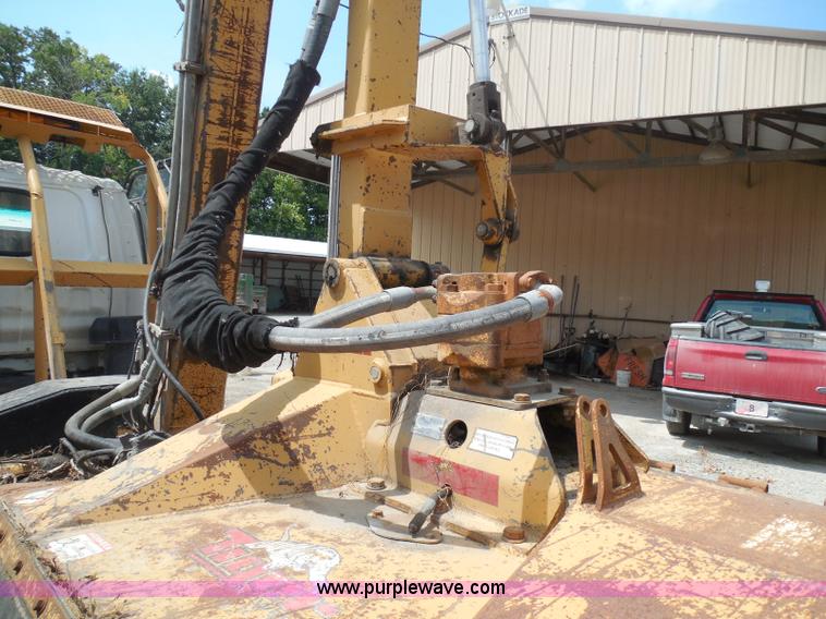 image for item K7527 2003 GMC W5500 flatbed truck with Tiger Truck Kat TRB-50C mower