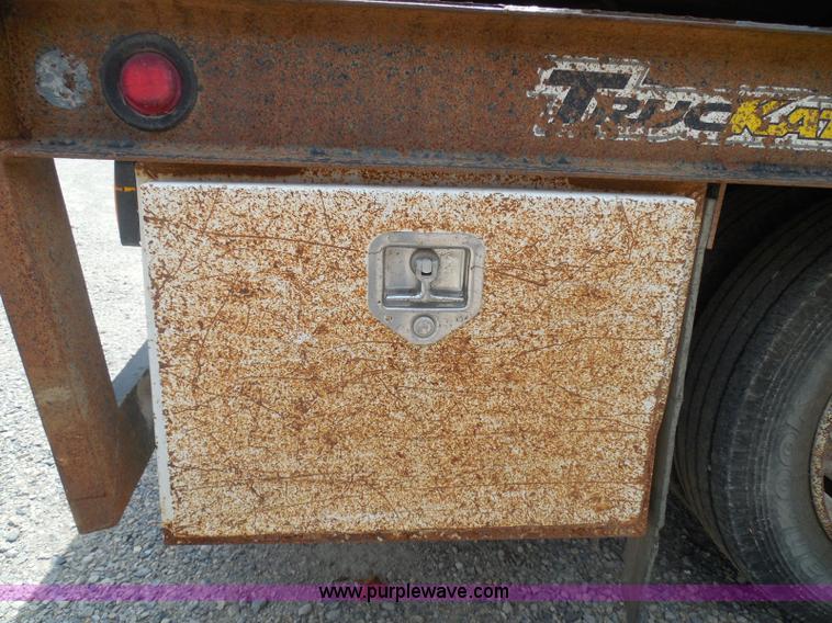 image for item K7527 2003 GMC W5500 flatbed truck with Tiger Truck Kat TRB-50C mower