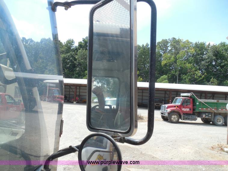 image for item K7527 2003 GMC W5500 flatbed truck with Tiger Truck Kat TRB-50C mower