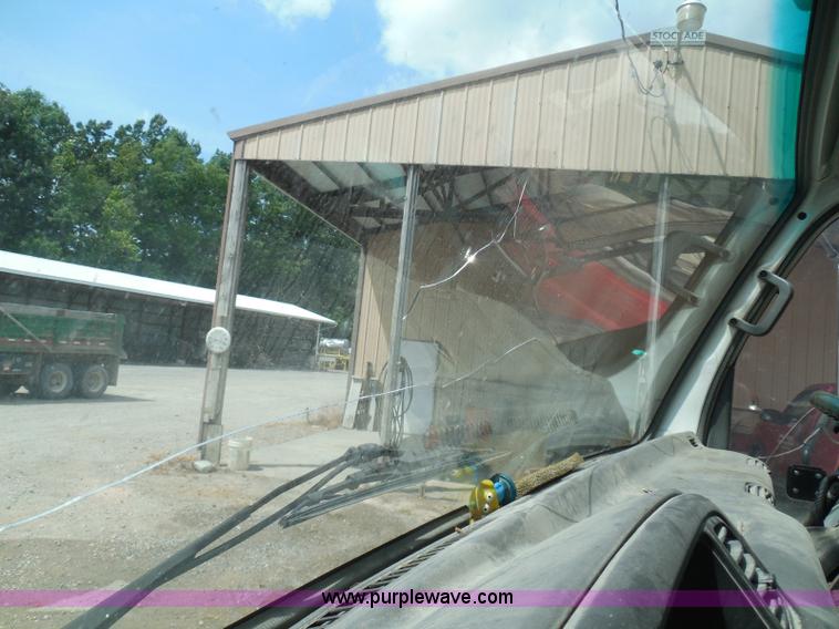 image for item K7527 2003 GMC W5500 flatbed truck with Tiger Truck Kat TRB-50C mower