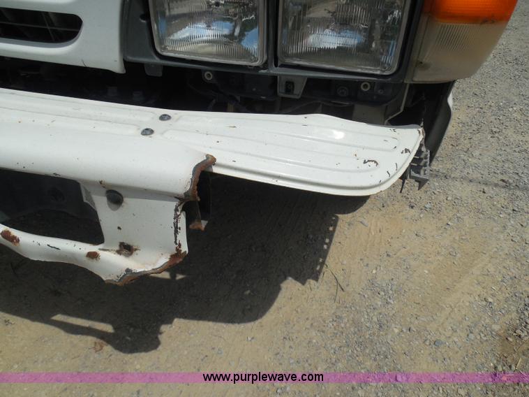 image for item K7527 2003 GMC W5500 flatbed truck with Tiger Truck Kat TRB-50C mower