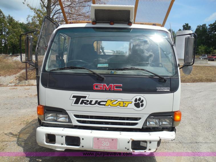 image for item K7527 2003 GMC W5500 flatbed truck with Tiger Truck Kat TRB-50C mower