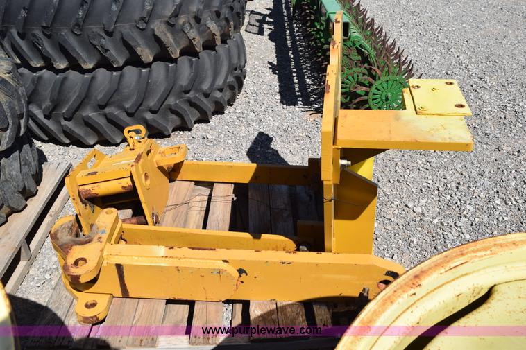 image for item BI9292 John Deere 9330 pan scraper hitch conversion