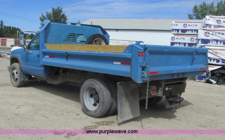 image for item A8858 1998 GMC Sierra 3500HD SL flatbed pickup truck