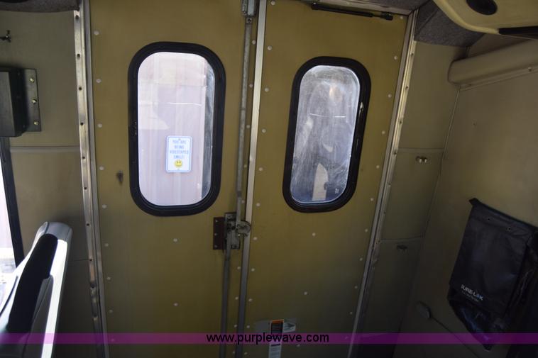 image for item J8114 2003 Ford 801 801 bus