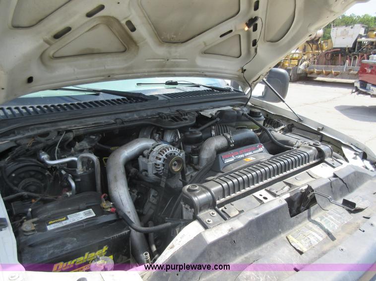 image for item J8668 2006 Ford F350 Super Duty flatbed pickup truck