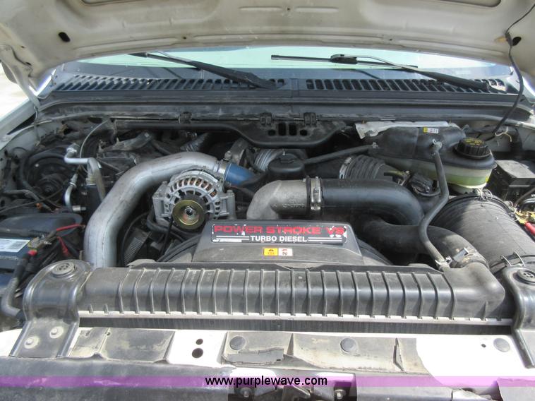 image for item J8668 2006 Ford F350 Super Duty flatbed pickup truck