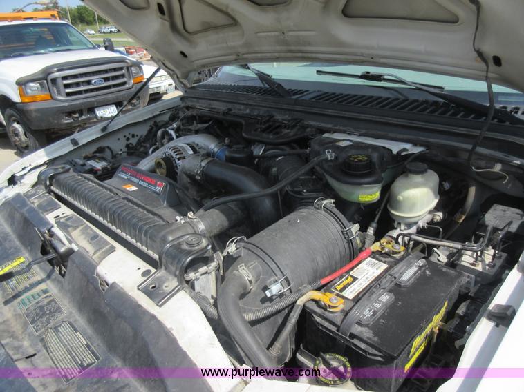 image for item J8668 2006 Ford F350 Super Duty flatbed pickup truck