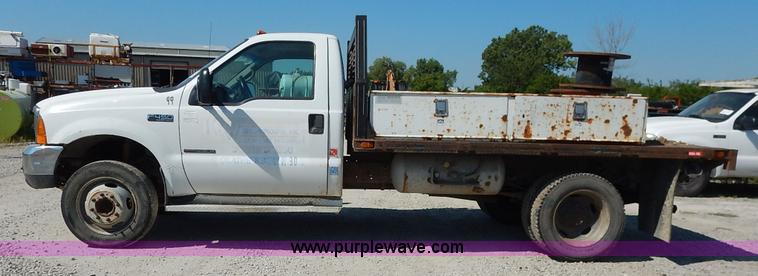 image for item K1589 2000 Ford F450 Super Duty XL flatbed truck