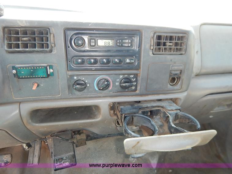 image for item K1589 2000 Ford F450 Super Duty XL flatbed truck