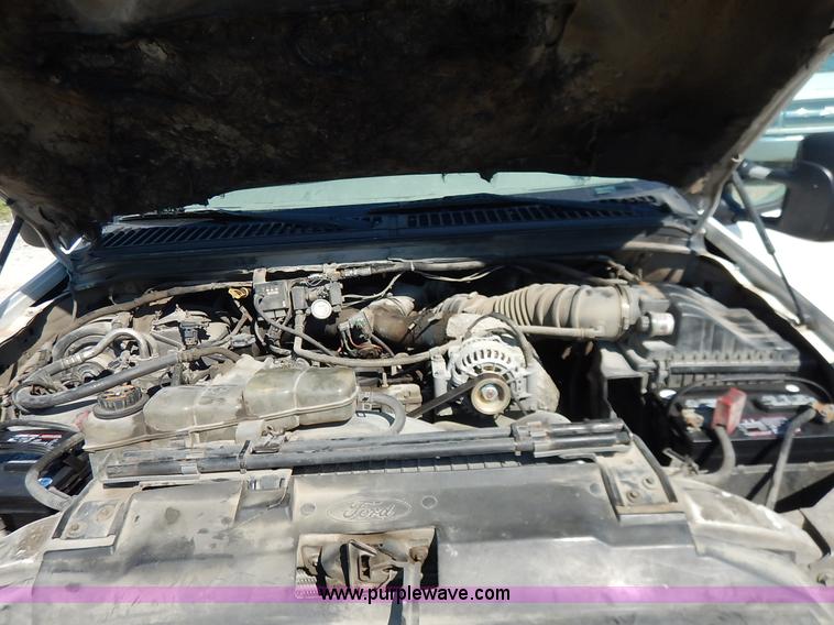 image for item K1589 2000 Ford F450 Super Duty XL flatbed truck