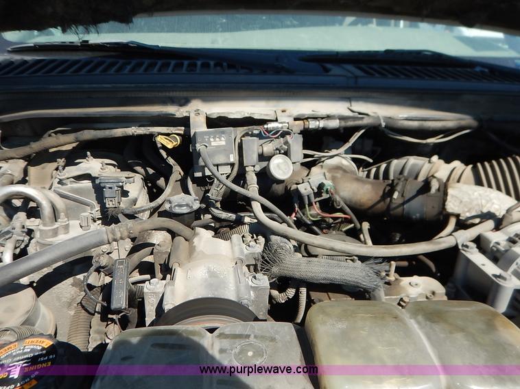 image for item K1589 2000 Ford F450 Super Duty XL flatbed truck