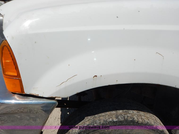 image for item K1589 2000 Ford F450 Super Duty XL flatbed truck