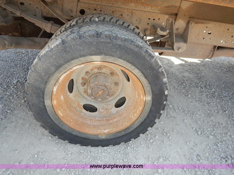 image for item K1589 2000 Ford F450 Super Duty XL flatbed truck