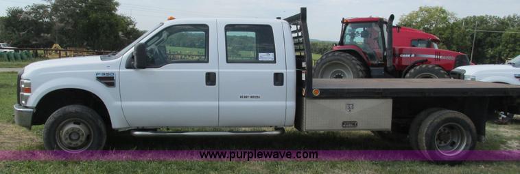 image for item L5259 2008 Ford F350 Super Duty Crew Cab flatbed pickup truck