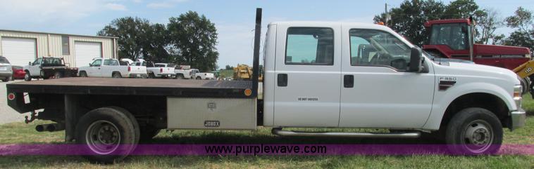 image for item L5259 2008 Ford F350 Super Duty Crew Cab flatbed pickup truck