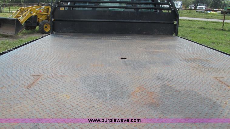 image for item L5259 2008 Ford F350 Super Duty Crew Cab flatbed pickup truck