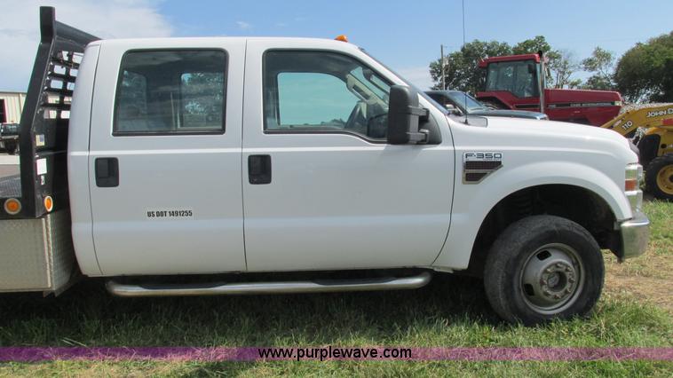image for item L5259 2008 Ford F350 Super Duty Crew Cab flatbed pickup truck