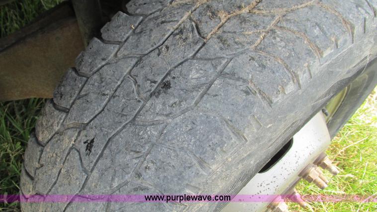 image for item L5259 2008 Ford F350 Super Duty Crew Cab flatbed pickup truck