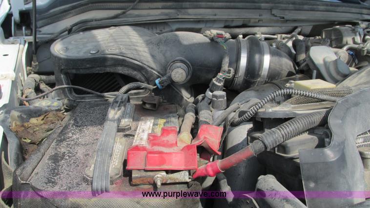 image for item L5259 2008 Ford F350 Super Duty Crew Cab flatbed pickup truck