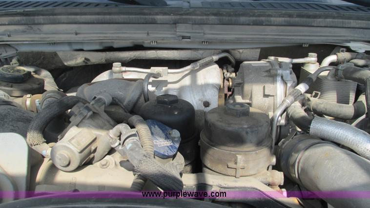 image for item L5259 2008 Ford F350 Super Duty Crew Cab flatbed pickup truck