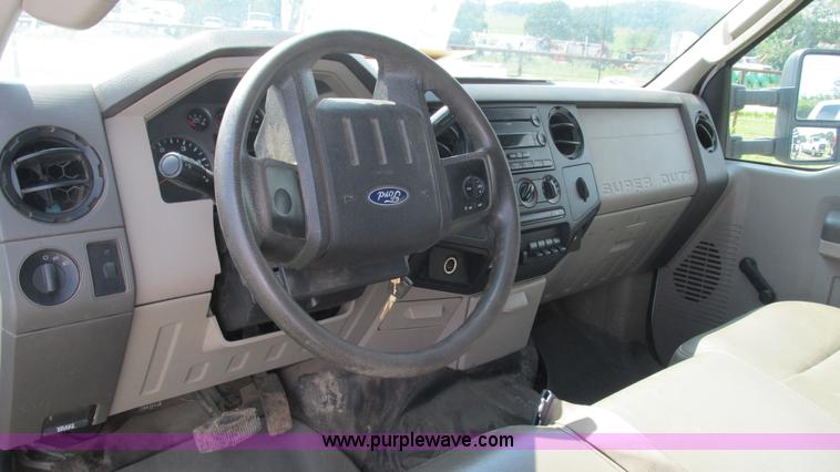 image for item L5259 2008 Ford F350 Super Duty Crew Cab flatbed pickup truck