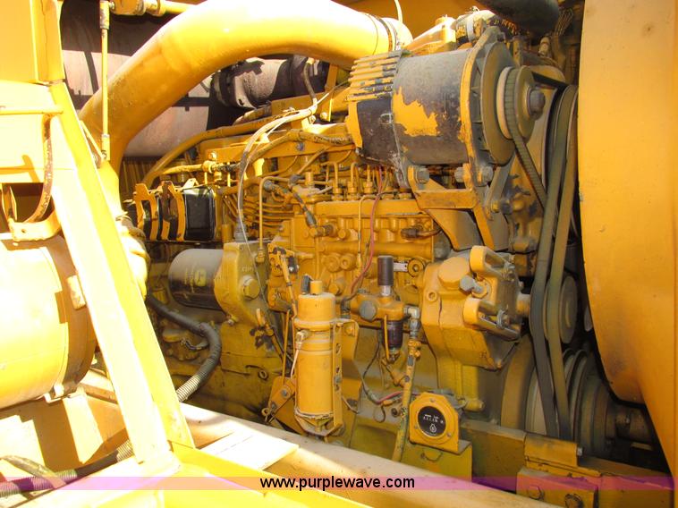 image for item H1241 1985 John Deere 762 scraper