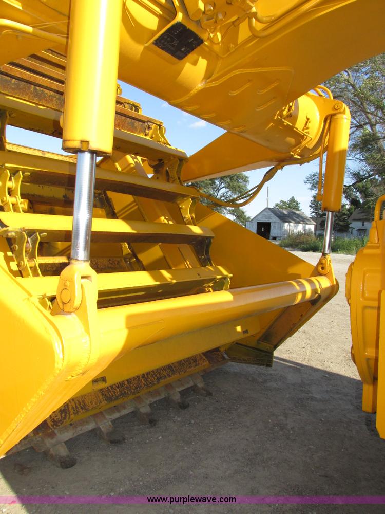 image for item H1241 1985 John Deere 762 scraper