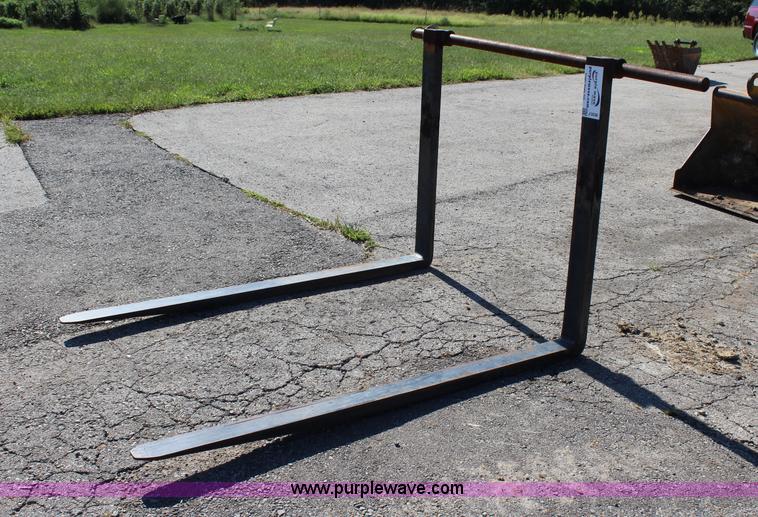 Backhoe pallet forks in Paola, KS Item J3536 sold Purple Wave