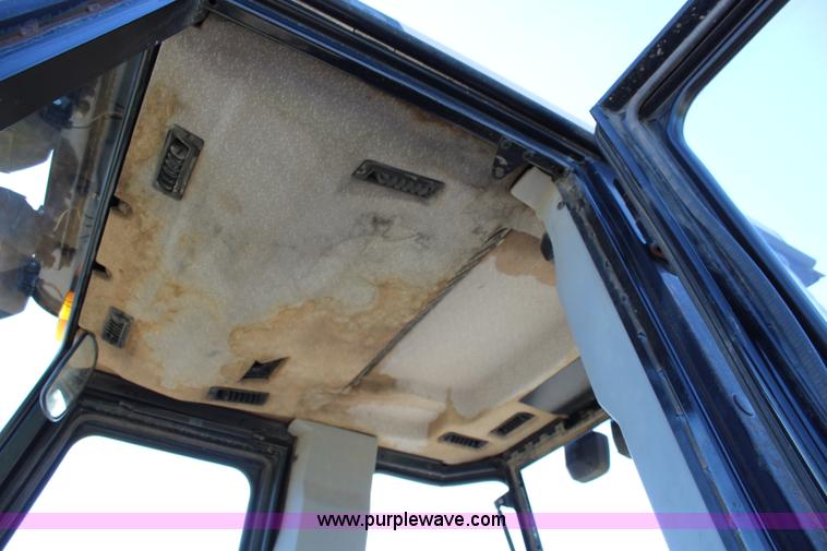 image for item J3709 1999 Caterpillar 416B backhoe