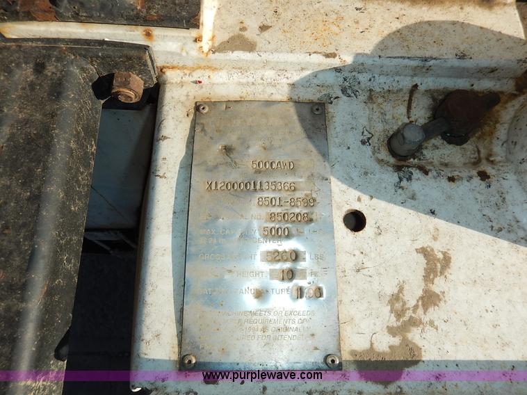 image for item J6460 1996 Tail Gator 5000AWD forklift