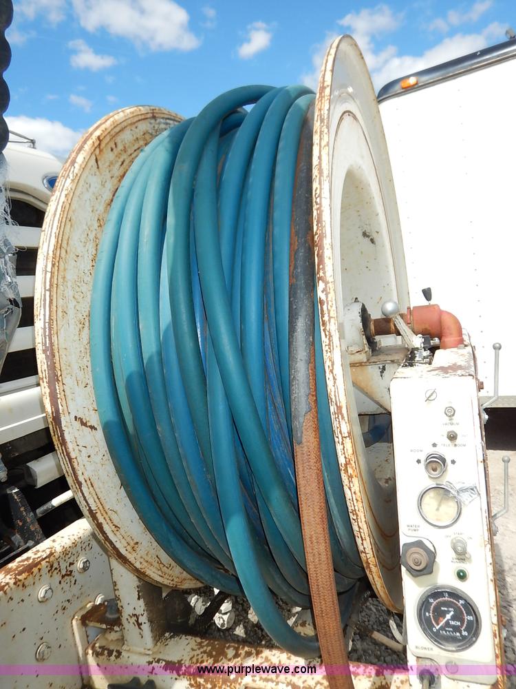 image for item J6484 1997 Ford LT8501 Louisville sewer rodder and vacuum excavation  truck