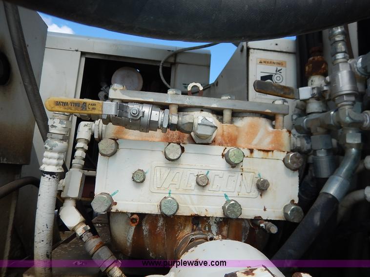 image for item J6484 1997 Ford LT8501 Louisville sewer rodder and vacuum excavation  truck