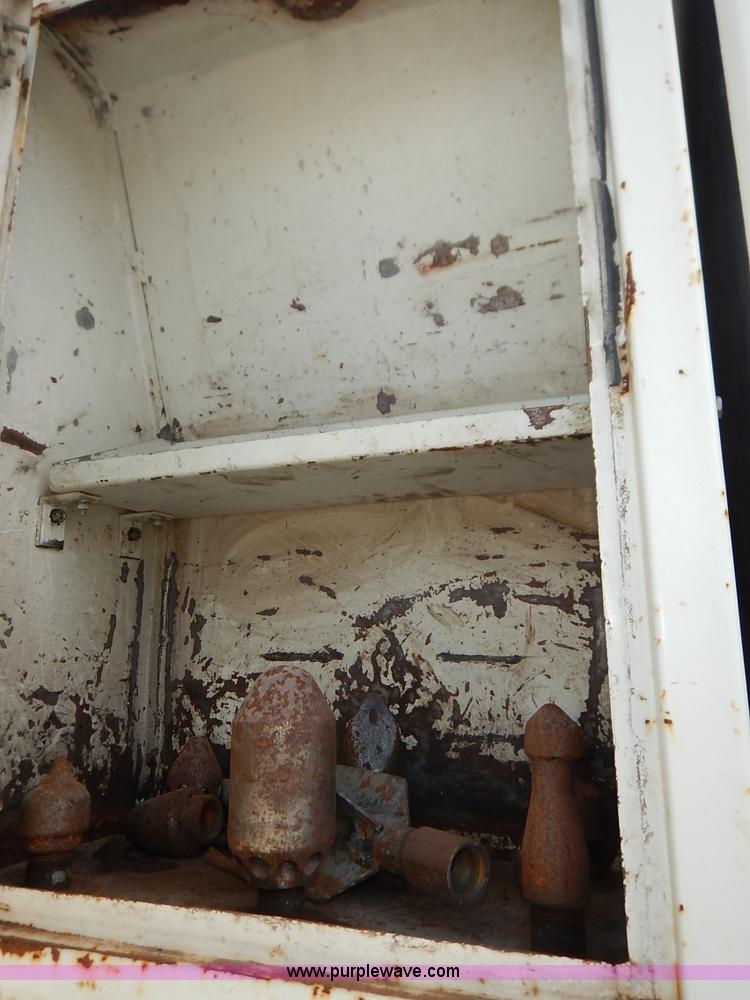 image for item J6484 1997 Ford LT8501 Louisville sewer rodder and vacuum excavation  truck