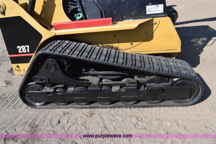 image for item J8199 2003 Caterpillar 287 skid steer