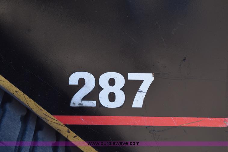 image for item J8199 2003 Caterpillar 287 skid steer