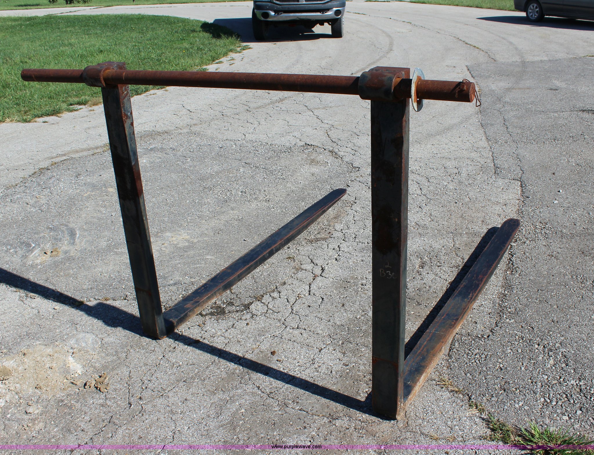 Backhoe pallet forks in Paola, KS Item J3536 sold Purple Wave