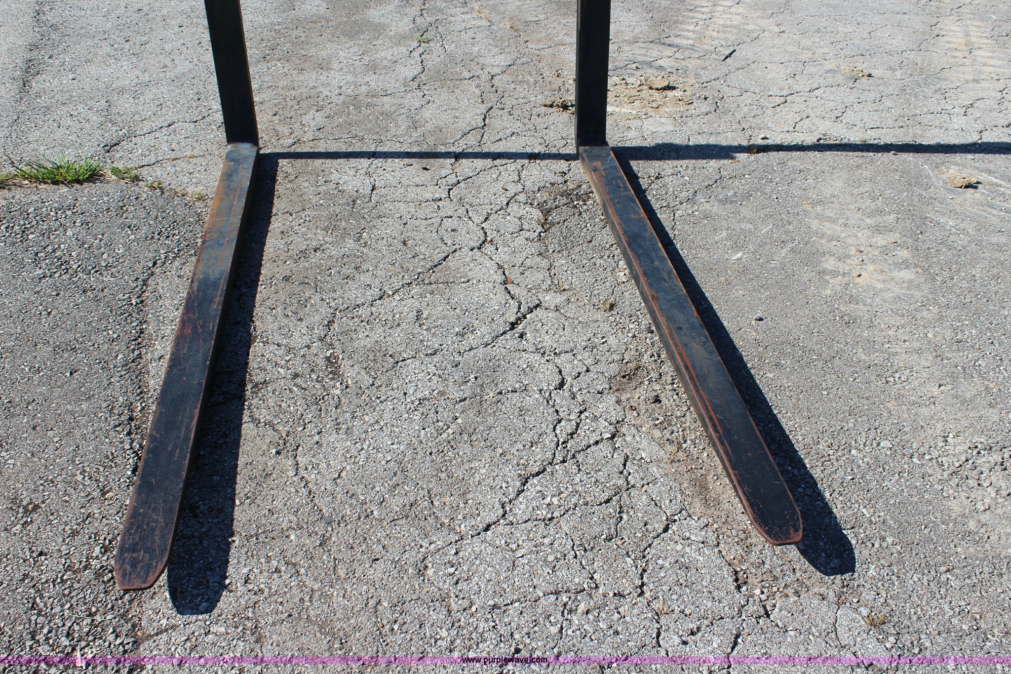 Backhoe pallet forks in Paola, KS Item J3536 sold Purple Wave