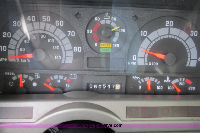 image for item J3645 2002 GMC C7500 dump truck