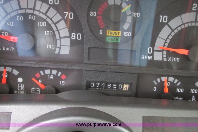 image for item J3648 2000 GMC C7500 dump truck