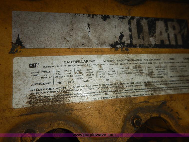 image for item J6421 2002 GMC C7500 dump truck