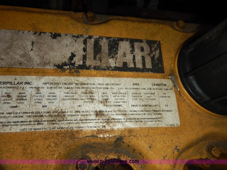 image for item J6421 2002 GMC C7500 dump truck