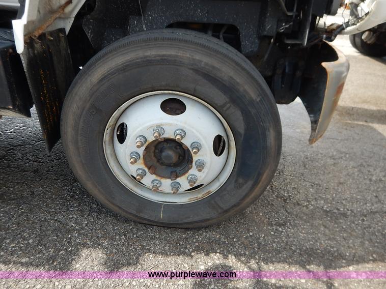 image for item J6421 2002 GMC C7500 dump truck