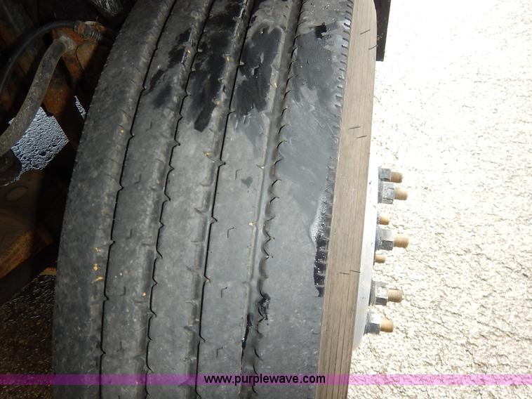 image for item J6421 2002 GMC C7500 dump truck