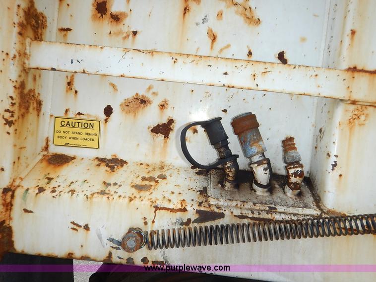 image for item J6421 2002 GMC C7500 dump truck