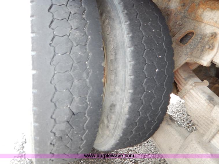 image for item J6421 2002 GMC C7500 dump truck