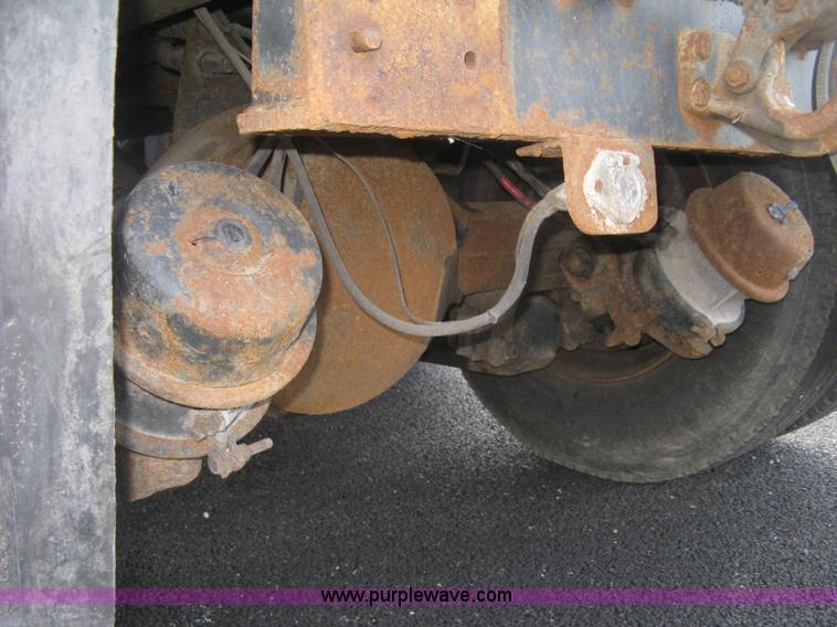 image for item L6357 2002 GMC C7500 dump truck