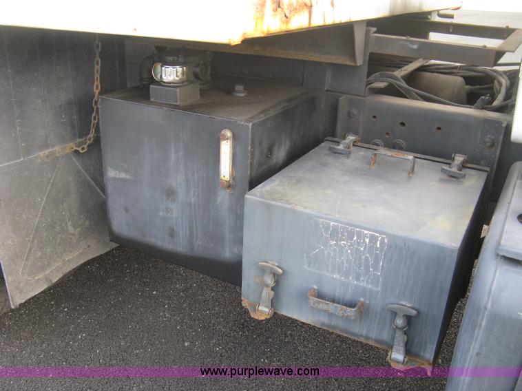 image for item L6357 2002 GMC C7500 dump truck