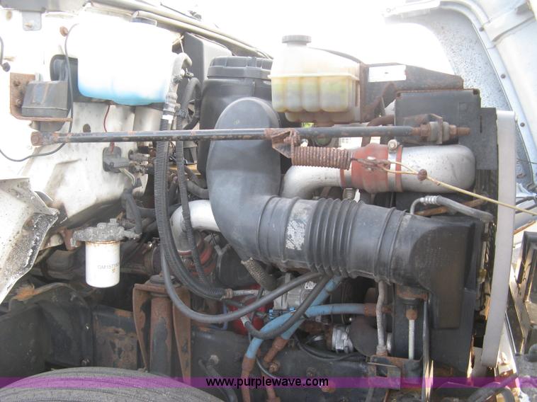 image for item L6357 2002 GMC C7500 dump truck