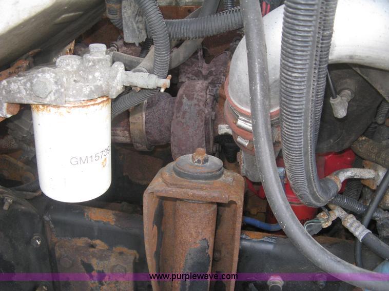 image for item L6357 2002 GMC C7500 dump truck